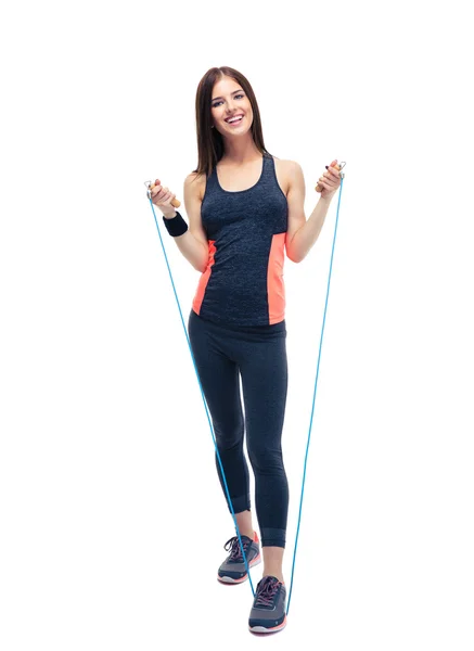Donna sportiva in piedi con corda da salto — Foto Stock