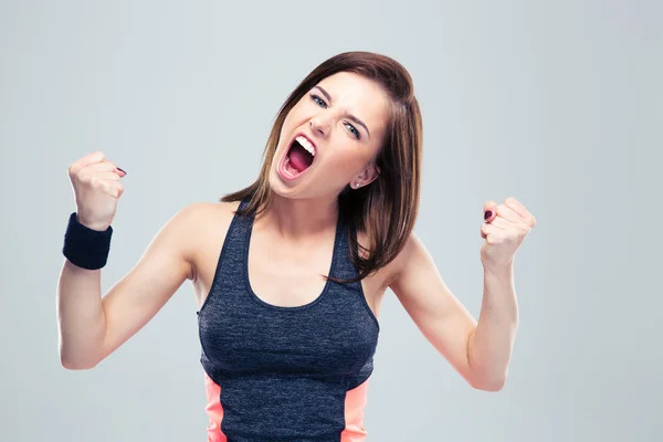 Enojado joven deportivo mujer gritando — Foto de Stock