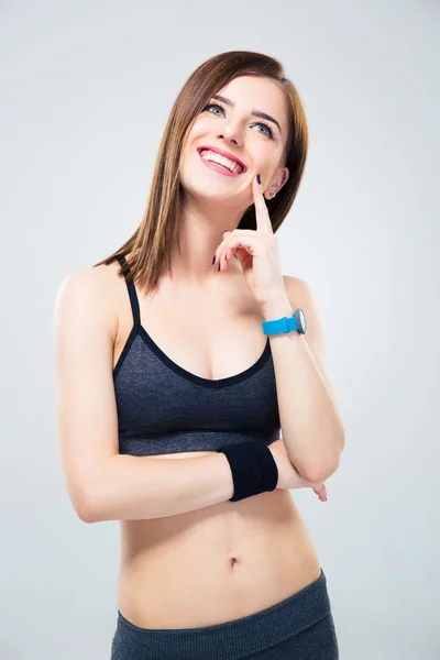 Feliz mulher esportiva olhando para cima — Fotografia de Stock