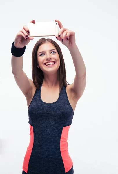 Sorrindo mulher desportiva fazendo foto selfie — Fotografia de Stock