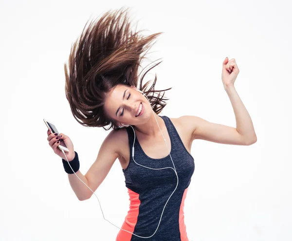 Hermosa mujer con auriculares en movimiento de baile — Foto de Stock