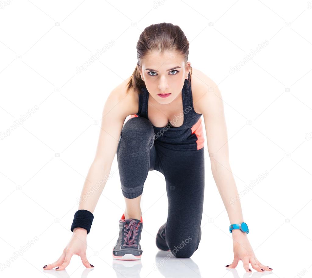 Runner sporty woman in start position