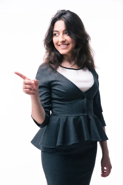 Lächelnde Geschäftsfrau zeigt mit dem Finger weg — Stockfoto