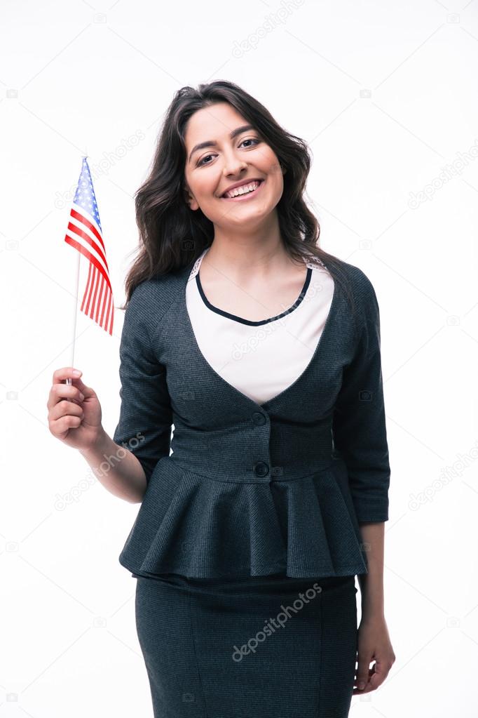 Smiling businesswoman holding US flag 