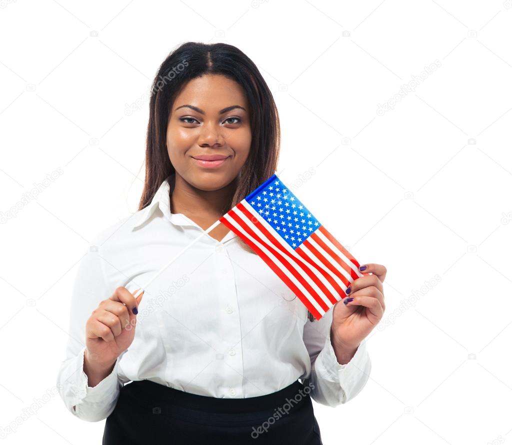 Smiling african busiensswoman holding US flag