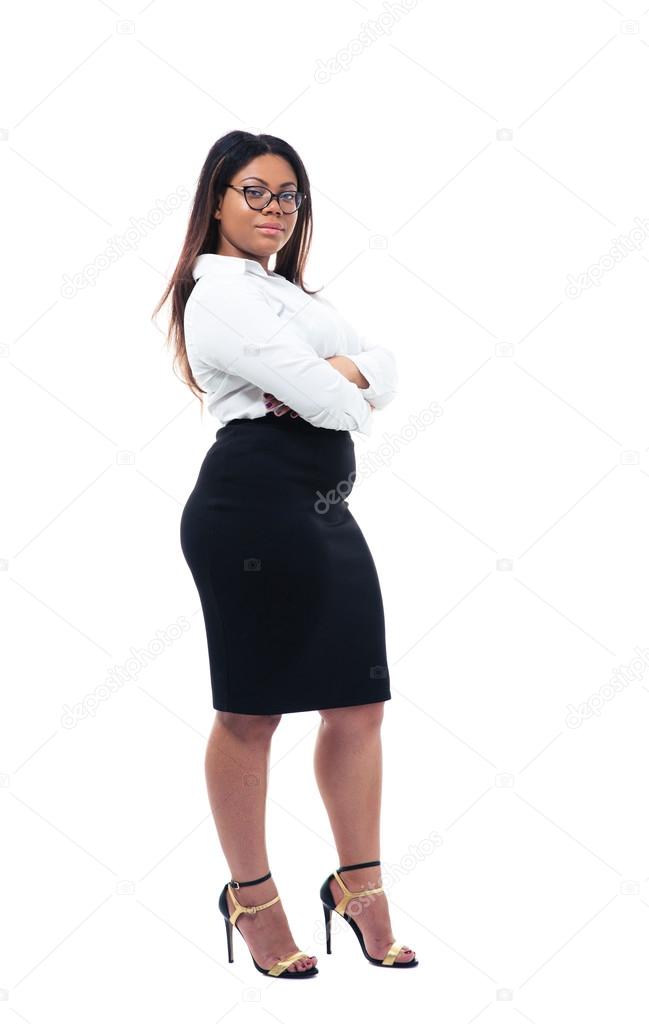 Businesswoman standing with arms folded