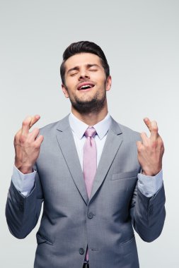 parmak çarpı işareti ile işadamı