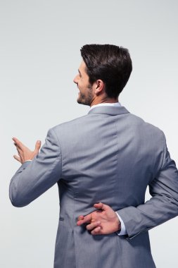 parmak çarpı işareti ile işadamı