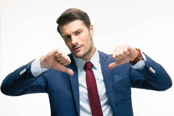 Businessman showing thumbs down sign — Stock Photo, Image