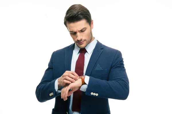 Handsome businessman looking on his wrist watch — Stock Photo, Image