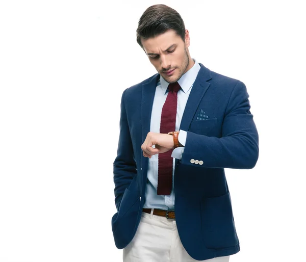 Pewni biznesmen patrząc na jego zegarek na rękę — Zdjęcie stockowe