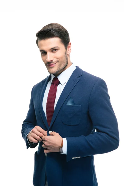 Feliz hombre de negocios guapo poniéndose chaqueta de traje — Foto de Stock