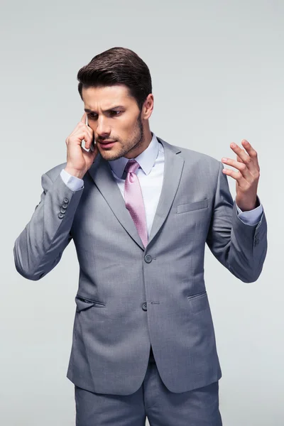 Handsome businessman talking on the phone — Stock Photo, Image