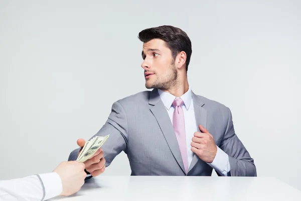 Businessman taking bribe — Stock Photo, Image