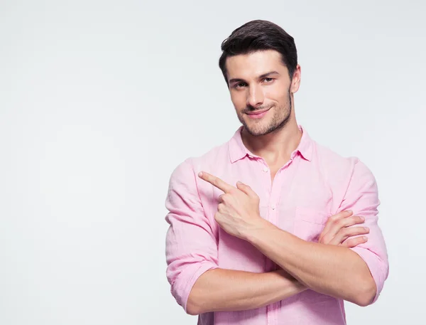 Feliz hombre de negocios señalando con el dedo — Foto de Stock