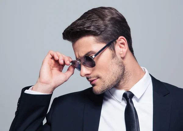 Portrait of a fashion businessman in sunglasses — Stock Photo, Image