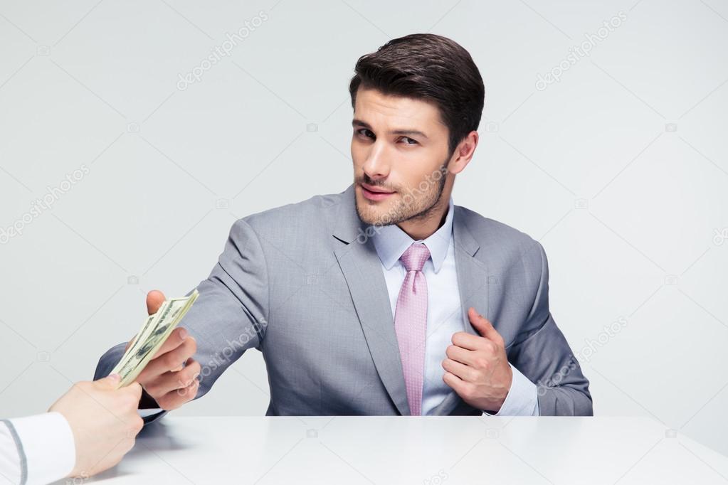 Businessman taking bribe