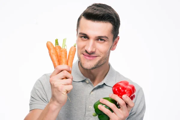 野菜を持って笑顔の若い男 — ストック写真