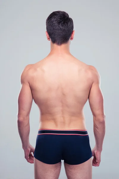 Visão traseira retrato de um homem musculoso — Fotografia de Stock