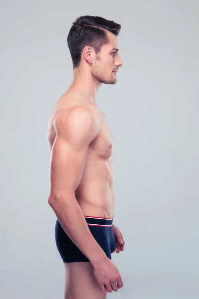 Side view portrait of a muscular man — Stock Photo, Image