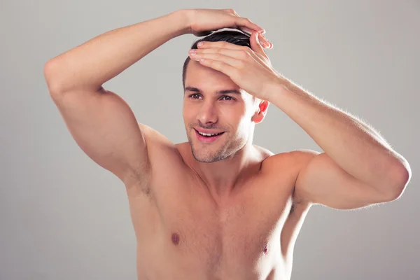 Portrait of a happy young man with nude torso — Stock Photo, Image