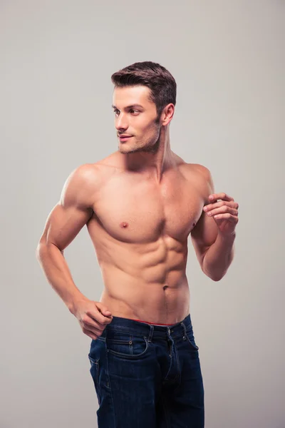 Muscular handsome man looking away — Stock Photo, Image