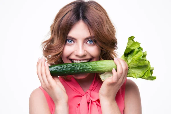 Happy cute woman holding cucumber and salad — Stock Photo, Image