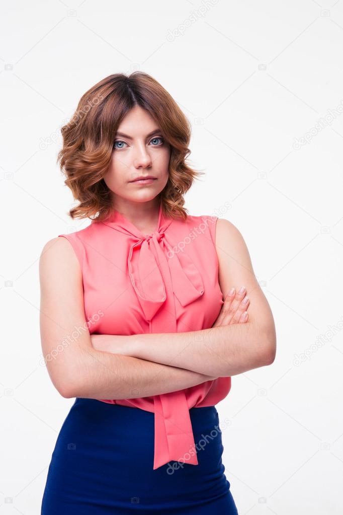 Attractive young woman with arms folded