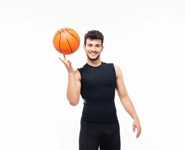 Jogador de basquete bola girando em seu dedo — Fotografia de Stock