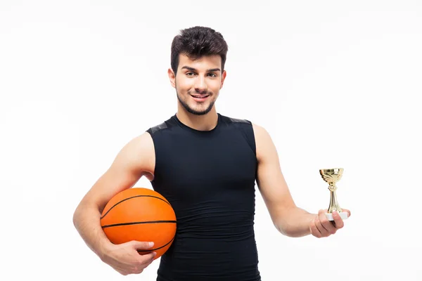 Jogador de basquete segurando vencedores copo — Fotografia de Stock