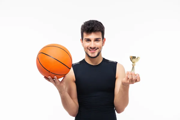 Basketball player holding winners cup — Stock Photo, Image