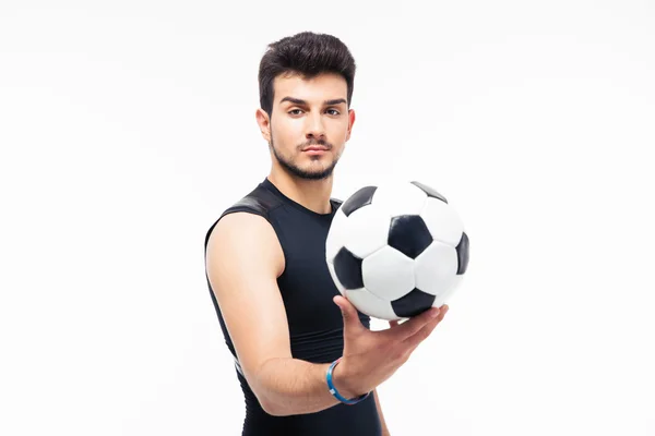 Handsome soccer player holding ball — Stock Photo, Image