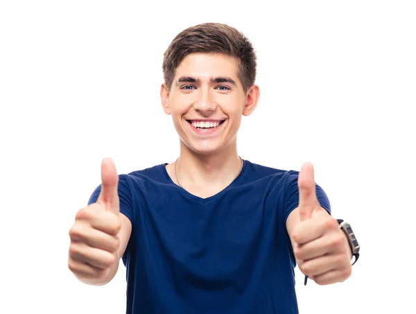 Usmívající se mladý muž ukazuje palec — Stock fotografie