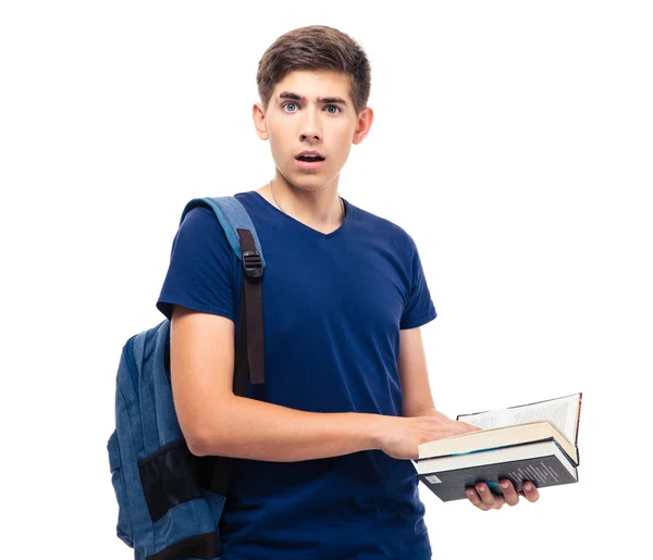 Surpreendido estudante do sexo masculino segurando livro — Fotografia de Stock
