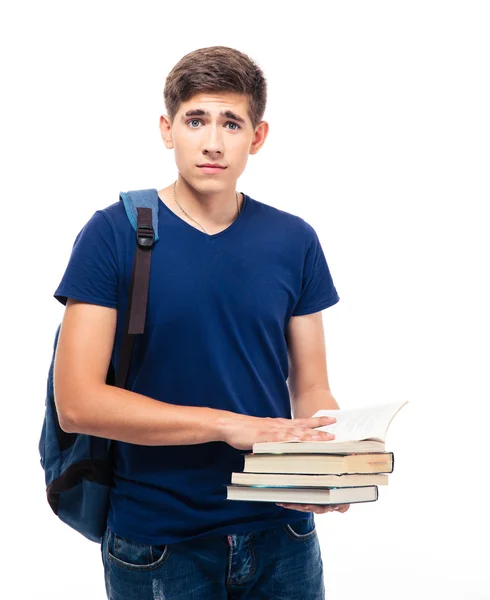 Estudiante masculino serio sosteniendo libros — Foto de Stock