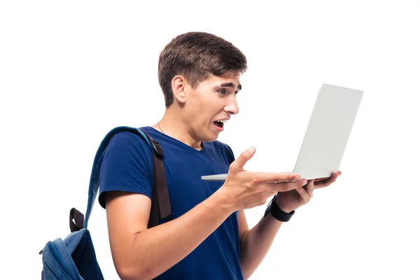 Manlig student med upprörda känslor hålla laptop — Stockfoto