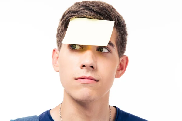 Closeup portret van een man met sticker op het voorhoofd — Stockfoto