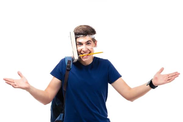 Male student with book and pencil strapped to his head — Stock Photo, Image