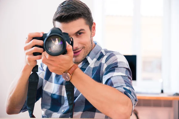 Man shooting with photo camera — Stock Photo, Image