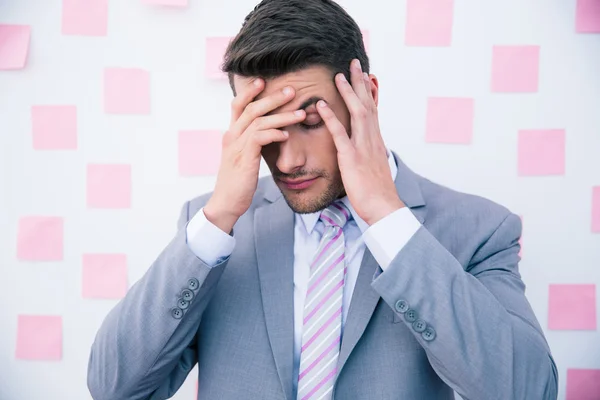 Businessman having headache — Stock Photo, Image