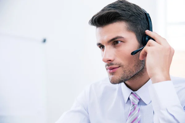 Portrait of a male operator with headset — Stock Photo, Image