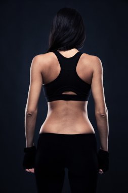 Back view portrait of a fitness woman 