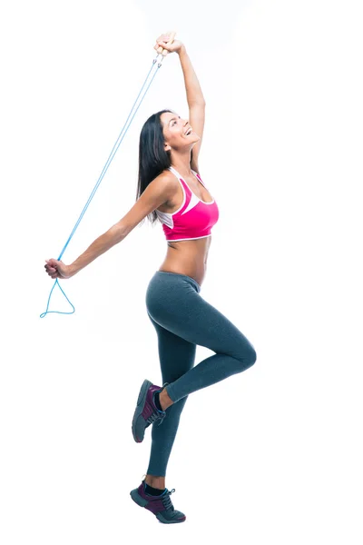 Fitness woman stretching with skipping rope — 图库照片
