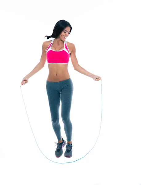 Happy sports woman jumping with skipping rope — 图库照片