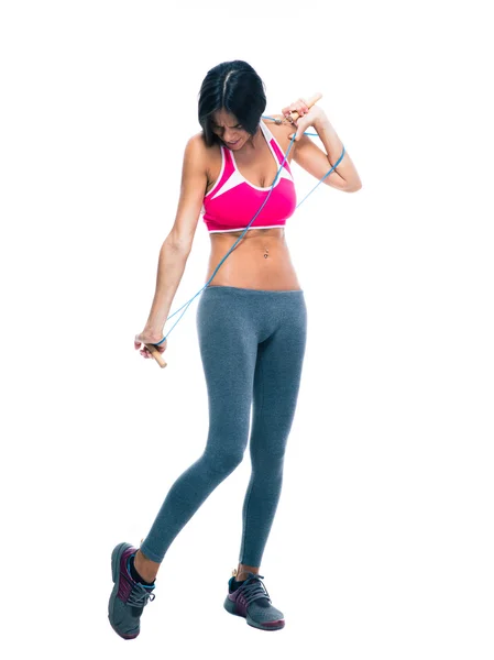 Sports woman stretching with skipping rope — Stok fotoğraf