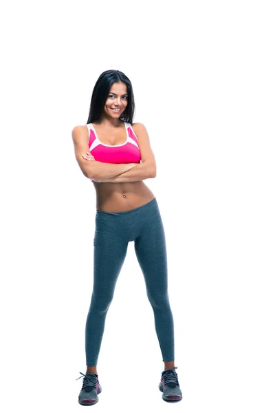 Mulher fitness de pé com os braços dobrados — Fotografia de Stock