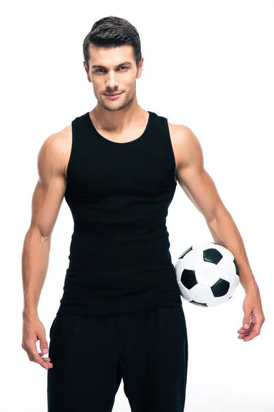 Handsome soccer player holding ball — Stock Photo, Image