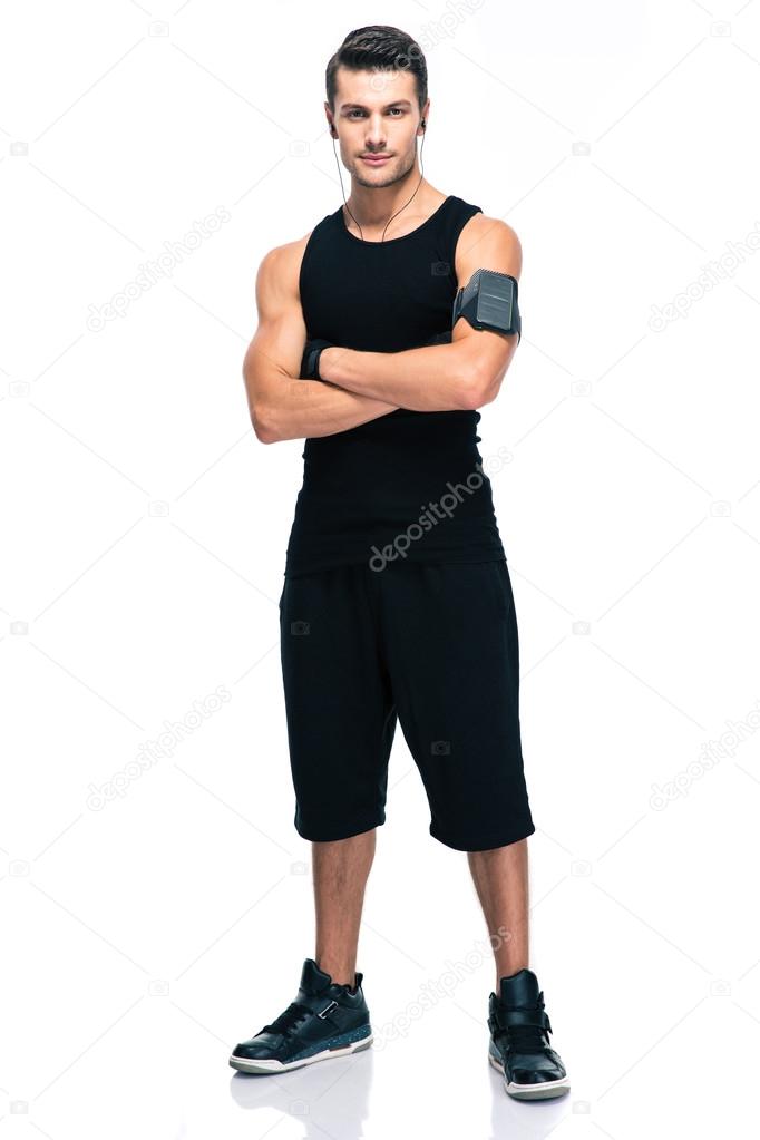 Sports man standing with arms folded