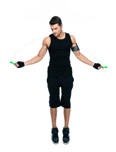 Fitness man jumping with skipping rope — Stockfoto