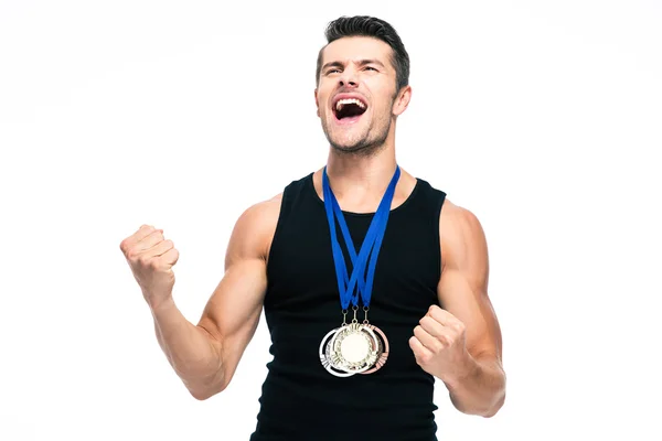 Fitness man with medals celebrating his success — Stok fotoğraf